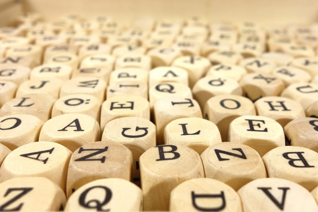 Wooden cubes with letters of the alphabet on each