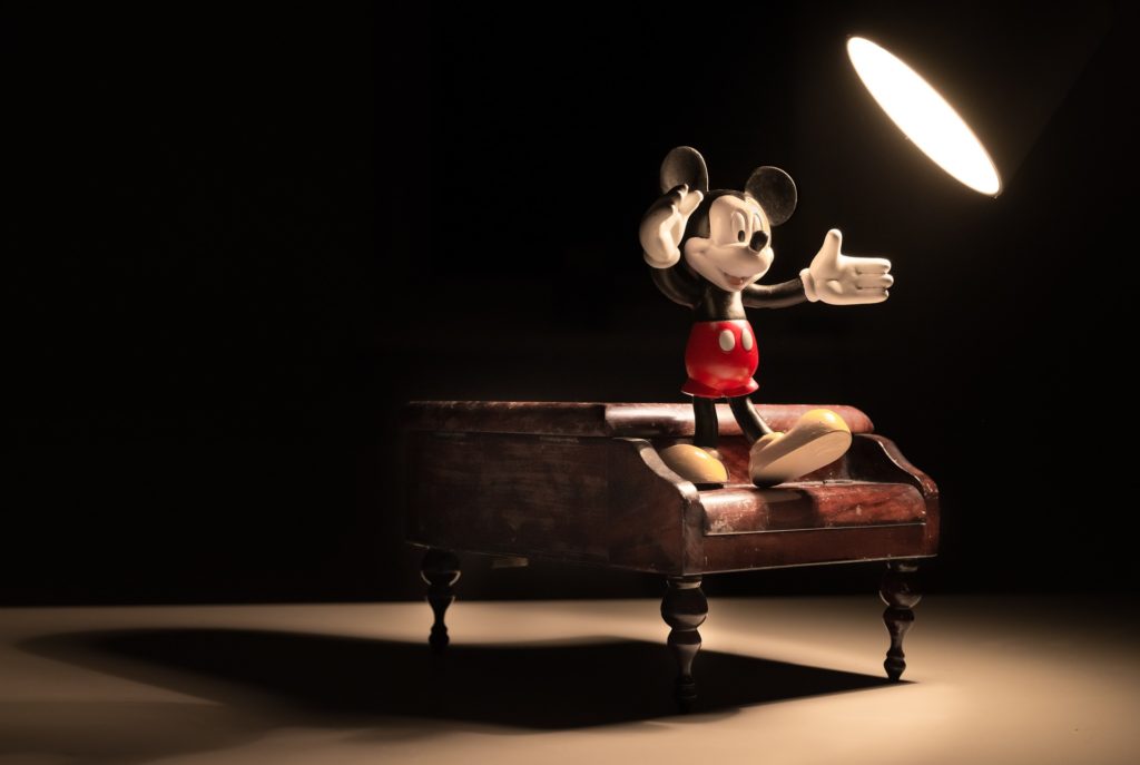 Model of Mickey Mouse on a grand piano